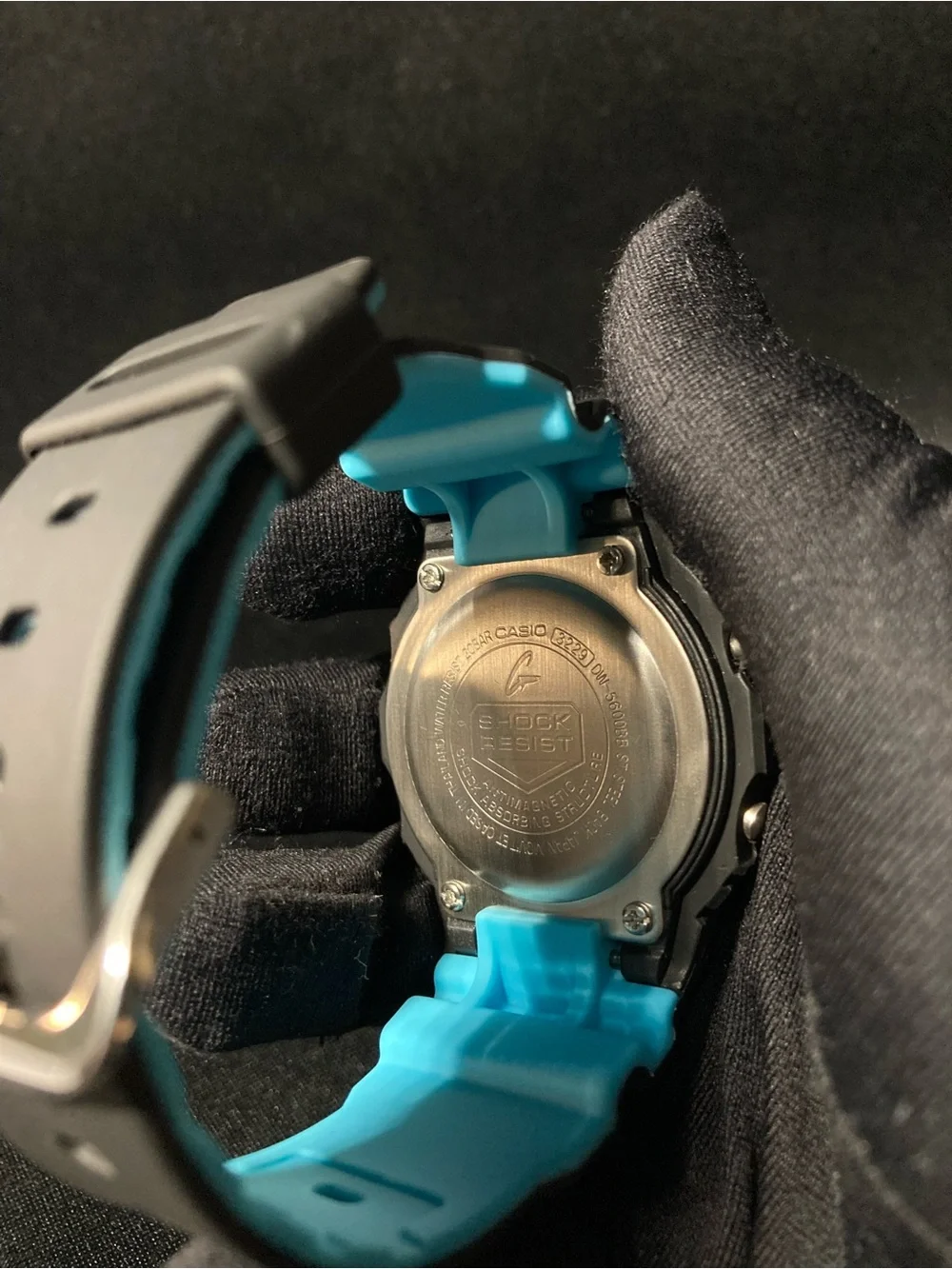 Teal and Black G Shock Dw5600